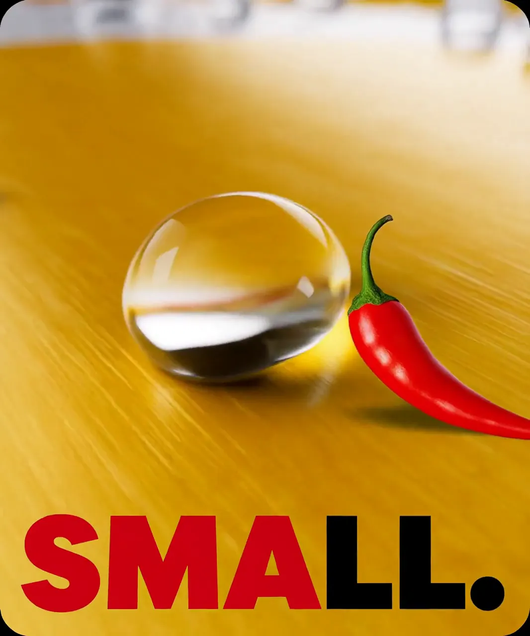 Film frame: Small, a droplet and a chilli in macro